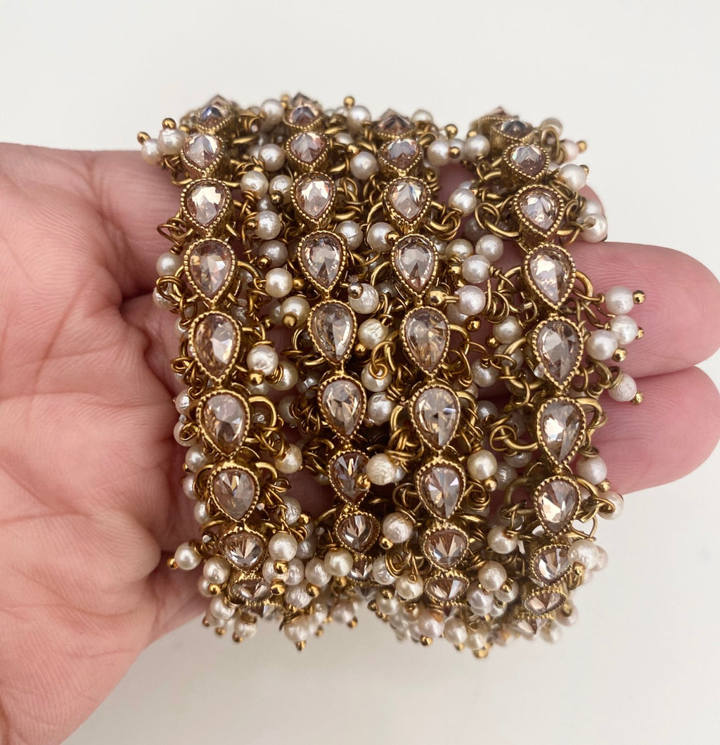 Tear drop pearl trim (champagne ) image 1
