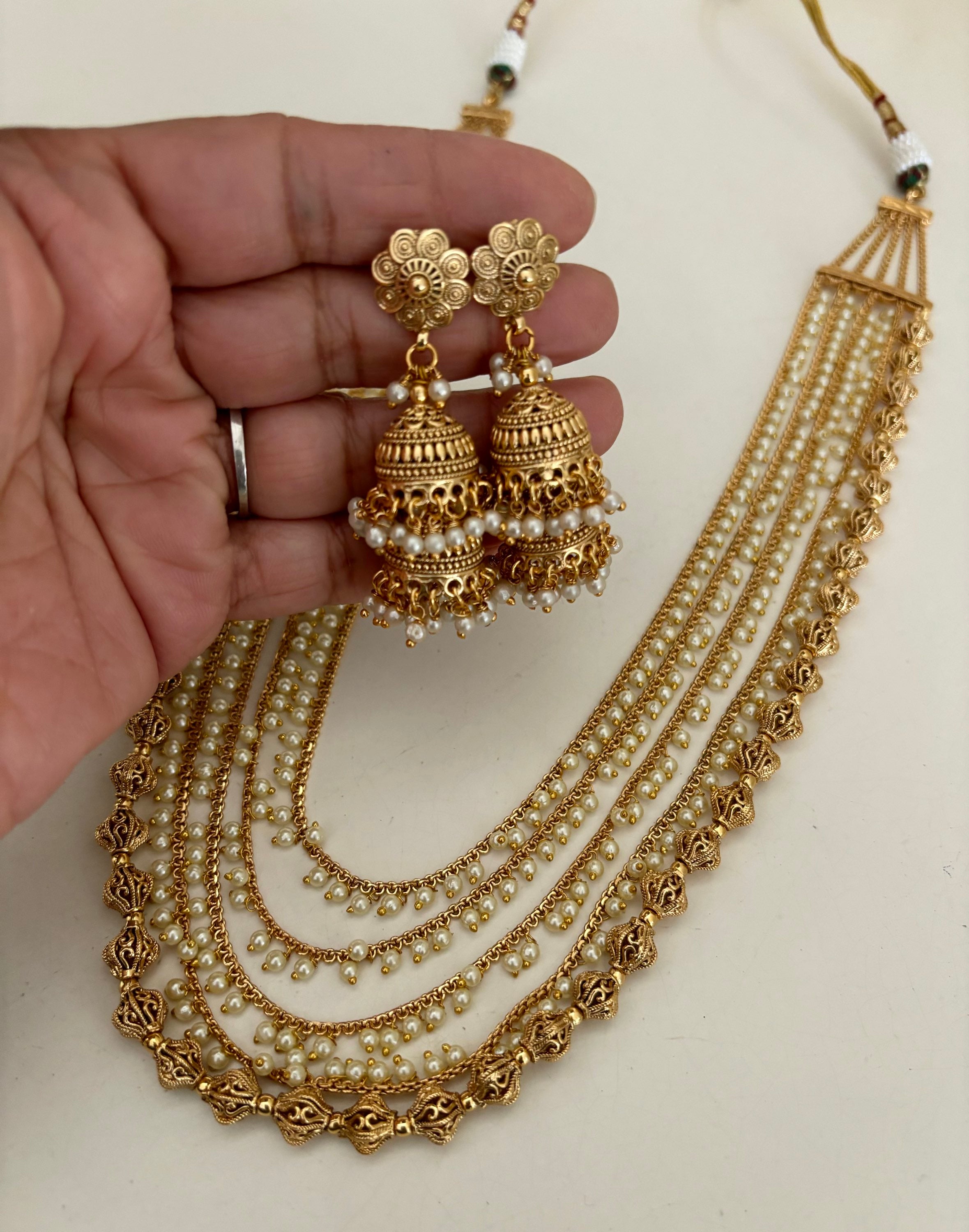 Long layared haar with pearl drop image 0
