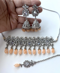 Silver orange peach droplet  image 0