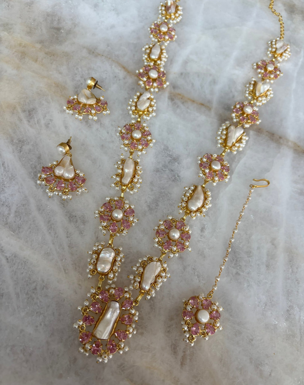 IH Swarovski (J) - Ishy Haq